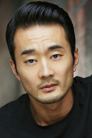 Photo of Jon Komp Shin as FBI Forensics Agent
