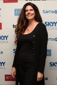 Photo of Gia Milani as Chuck Marble