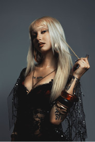 Photo of Metrika as Herself