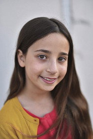 Photo of Flora Feldman as Emmy