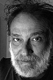 Photo of Alex Sernambi as Policial