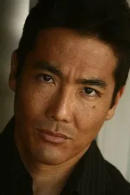 Photo of John Koyama as Eddie Chin