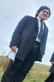 Photo of Oliver Walkin Bell as Boss 2