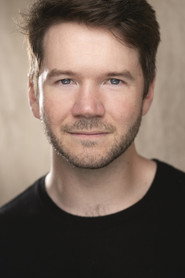 Photo of James Caverly as Adam Song