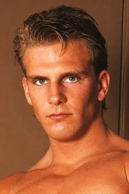 Photo of Rex Chandler as (archived footage)