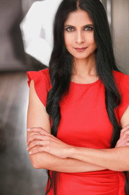 Photo of Nadine Naidoo as Reema Hannah