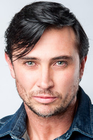 Photo of Llewellyn Cordier as Father James