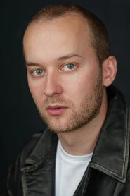 Photo of Andry Vildak as Officer Hewitt