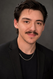 Photo of Jay Evans as Greg Schneider