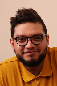 Photo of Mohsen Ahmed as Guy on the phone