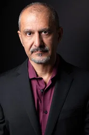 Photo of Gus Khosrowkhani as Karim