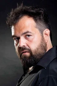 Photo of Mark Ullod as Professor