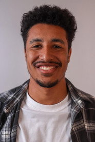 Photo of Adam Buffini as IRS Agent