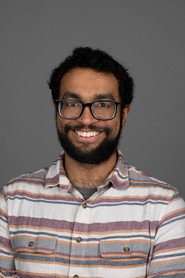 Photo of Andre Hall as Paulie
