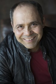Photo of Kamel Benchemekh as Grocer