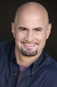 Photo of James Ray as Gene Isis