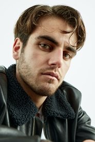 Photo of Malone Ettori as Capitaine Benoît Sarkissian