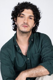 Photo of Neil Elias as Alain