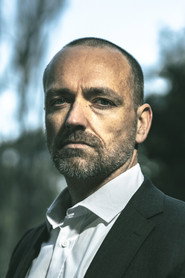 Photo of Luke Hendrickson as Detective
