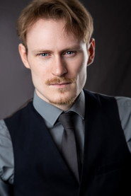 Photo of Chris Bamford as Mr React