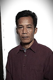 Photo of Andreas Sarjono as Pak Andra