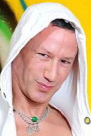 Photo of Chris Tee as (archive footage)