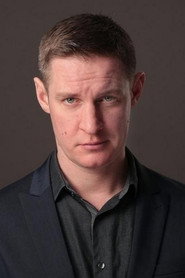 Photo of Bartosz Głogowski as Wikary Piotr Kamiński