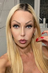 Photo of Renata Davila as (archive footage)