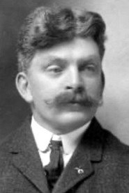 Photo of Porter Strong as Rev. Peter