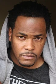Photo of Hakim Callender as Hotel Security Guard