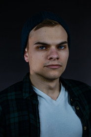 Photo of Samuel Burton-Harris as Johnny aka The Bassist
