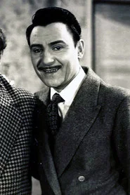 Photo of Francisco Charmiello as Don Serafín, organista del colegio / Sr. Floridor