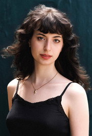 Photo of Tess Nealon Raskin as Cleo