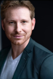 Photo of Archibald C. McColl IV as Phil Johnson