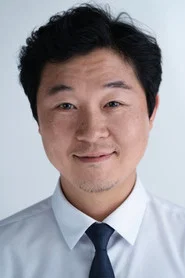 Photo of Lee Chung-hun as Kim Jae-gyu's Secretary of Staff