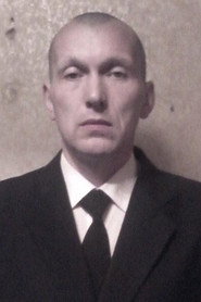 Photo of Dmitriy Aleksandrov as Cuba's security guard