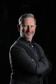Photo of John Martin as Radio (V.O)