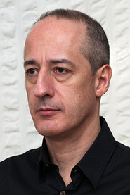 Photo of Menelaos Hazarakis as Father Angelo