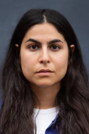 Photo of Homa Faghiri as Mina Hedayat