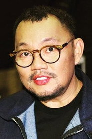 Photo of Michael Ang as Director Fabian