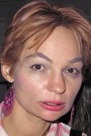 Photo of Pénélope Palmer as Evelyne