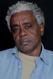 Photo of Romeu Evaristo as Santos