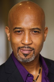 Photo of Scott F. Evans as Secretary of Defense August Strickland