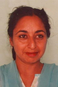 Photo of Navnindra Behl as Lalita "Amma" Mohan