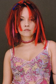 Photo of Dominique Davalos as Kim