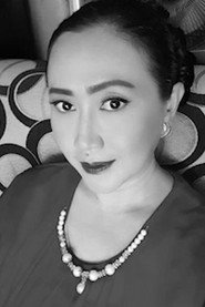 Photo of Rosita Simatupang as Tuti