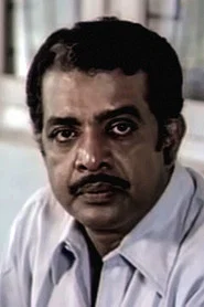Photo of P K  Abraham as Krishnan Nair