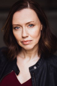 Photo of René Zara as Dr. Lydia Cromwell