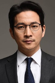 Photo of Kim Sung-gon as Teacher Cho