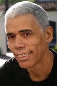 Photo of Desi Singh as Que / Reptilicant